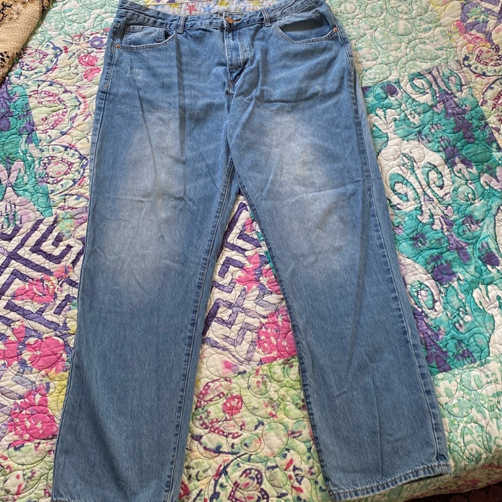 Distressed bootcut denim jeans